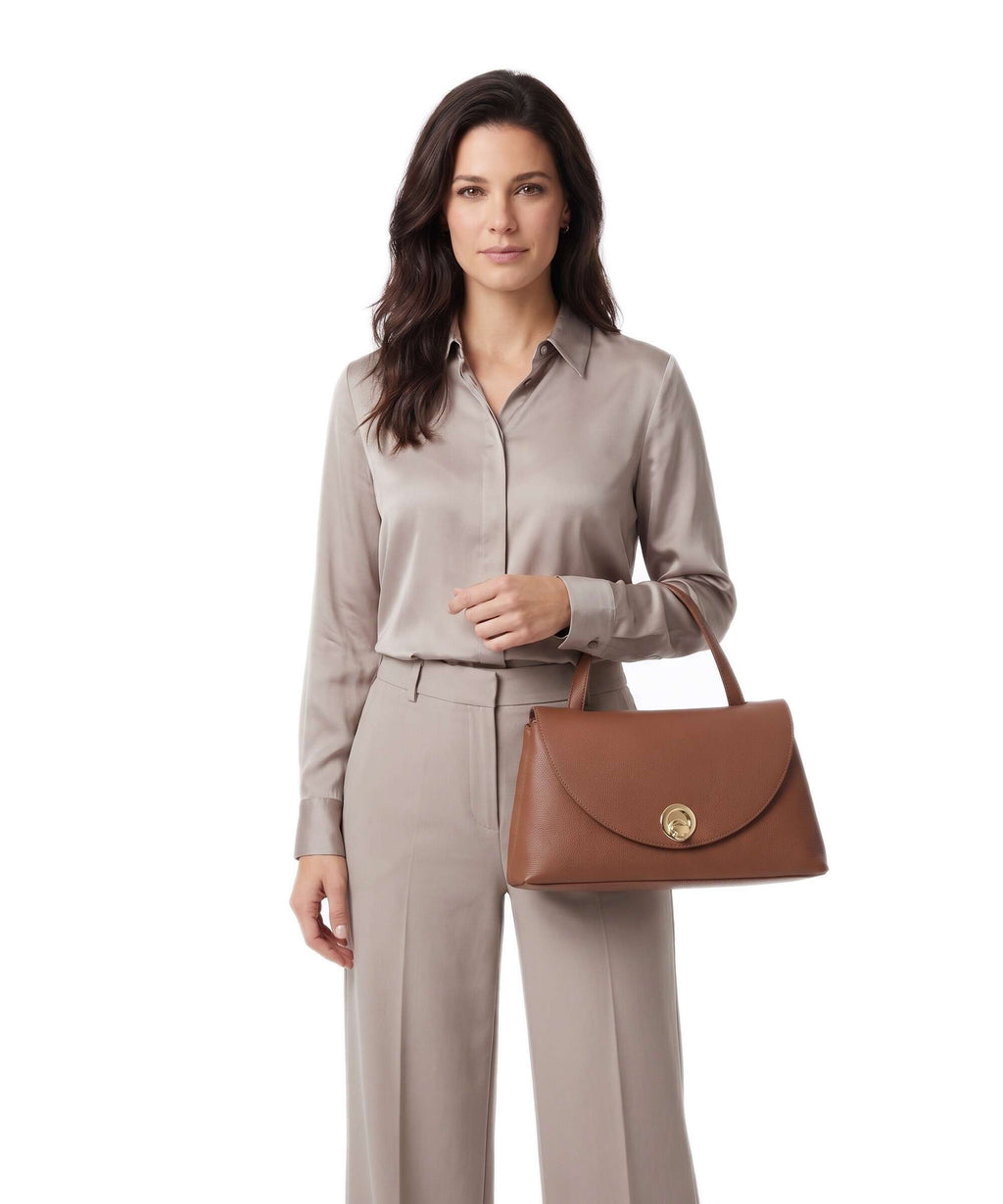 Coccinelle Nikla Handbag cognac/noir